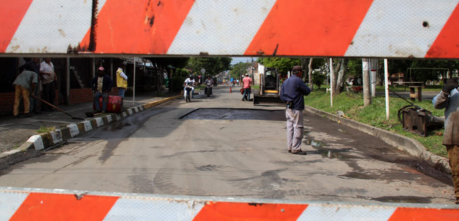 Habitantes del barrio El Jard�n hacen Huecot�n para rehabilitar sus calles