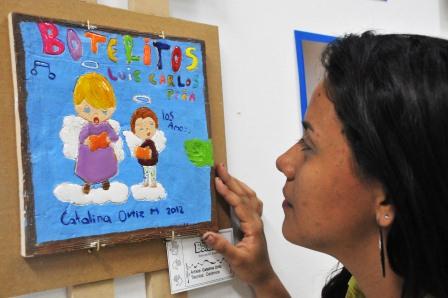 Una exposici�n con �ngeles que le cantan a la Sucursal del cielo